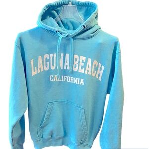 Aqua Blue Hoodie with Laguna Beach California in White Lettering.  Size = Small.